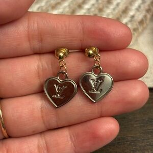 Silver and gold Louis Vuitton heart earrings